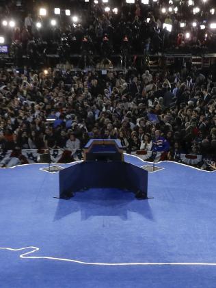 John Podesta, campaign chairman, turns and walks off the stage after announcing that Democratic presidential nominee Hillary Clinton will not be making an appearance at Jacob Javits Center in New York, Wednesday, Nov. 9, 2016 as the votes are still being counted. (AP Photo/Matt Rourke)