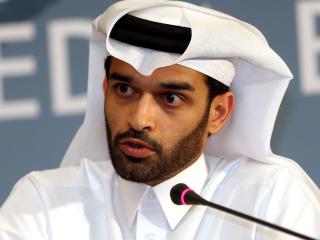 DOHA, QATAR- FEBRUARY 25: Hassan al-Thawadi, head of the Qatar 2022 World Cup organising committee, speaks during a press conference to defend the controversial proposal of the FIFA, the football's ruling body, to shift the 2022 World Cup from the normal summer time slot to November/December on February 25, 2015 in Doha. (Photo by Mohamed Farag/Anadolu Agency/Getty Images)