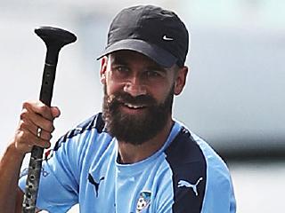 Sydney FC players paddleboarding