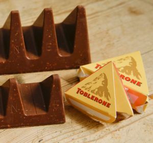 More valleys, fewer chocolate peaks: The old (rear) and new shape of Toblerone chocolate. 