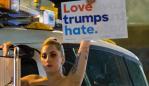 Musician Lagy Gaga stages a protest against Republican presidential nominee Donald Trump on a sanitation truck outside Trump Tower in New York City after midnight on election day November 9, 2016. Donald Trump stunned America and the world, riding a wave of populist resentment to defeat Hillary Clinton in the race to become the 45th president of the United States. The Republican mogul defeated his Democratic rival, plunging global markets into turmoil and casting the long-standing global political order, which hinges on Washington's leadership, into doubt. / AFP PHOTO / DOMINICK REUTER