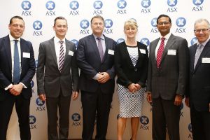 Charter Hall MD David Harrison (centre) poses with members of the board during the company listing at the ASX on Tuesday.