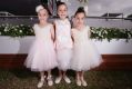 The Silvestro sisters, Alessia, 6, Allira, 8, and Allegra, 6, at the junior girls' Fashions on the Field on Stakes Day.