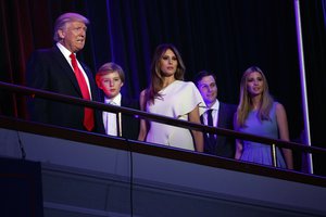 President-elect Donald Trump, left, arrives to speak at an election night rally, Wednesday, Nov. 9, 2016, in New York. From left, Trump, his son Barron, wife Melania, Jared Kushner, and Ivanka Trump. (AP Photo/ Evan Vucci)