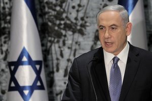 Israeli Prime Minister Benjamin Netanyahu speaks during a ceremony with Israeli President Reuven Rivlin, in Jerusalem, Wednesday, March 25, 2015. Netanyahu struck a conciliatory tone on Wednesday as he was formally tapped to form a new government, vowing to heal rifts in Israeli society and fix ties with the United States following an acrimonious election campaign.