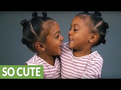 Twin girls realize they look exactly the same