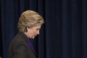 Democratic presidential candidate Hillary Clinton walks off the stage after speaking in New York, Wednesday, Nov. 9, 2016.