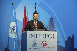 In this photo released by Xinhua News Agency, China's Vice Minister of Public Security Meng Hongwei delivers a campaign speech at the 85th session of the general assembly of the International Criminal Police Organization (Interpol), in Bali, Indonesia, Nov. 10, 2016.