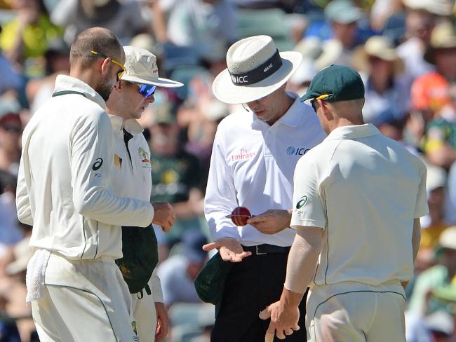 Nathan Lyon, Steve Smith And David Warner chat to the umpire at the WACA.