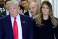 Senate Majority Leader Mitch McConnell, escorts US President-elect Donald Trump and First Lady-elect Melania Trump to a ...