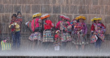A sudden rain storm in Cusco Peru meant that everyone had to run for cover. I spotted these gorgeous women sheltering at ...