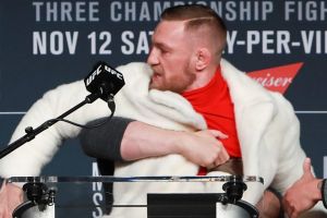 UFC president Dana White separates Conor McGregor and Eddie Alvarez during the UFC 205 press conference.