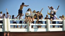 Students leap off bridge