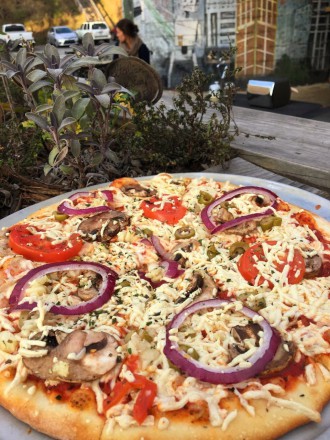 SAY (VEGAN) CHEESE: Asheville Pizza and Brewing Co. is one of several local pizza joints that offer the option of making any pizza dairy-free.