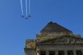 RAAF aircraft fly over the Shrine on Friday. 