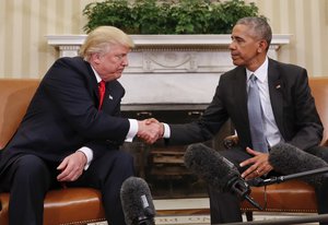 President Barack Obama and President-elect Donald Trump shake hands following their meeting in the Oval Office of the White House in Washington, Thursday, Nov. 10, 2016.