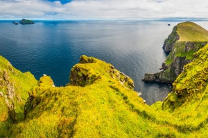 The green pastures and cliffs of St Kilda.