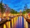 Westerkerk (Western Church), with water canal view in Amsterdam. 