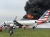 Passengers flee burning plane