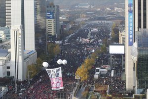 Protesters stage a rally calling for South Korean President Park Geun-hye to step down in Seoul, South Korea, Saturday, Nov. 12, 2016.