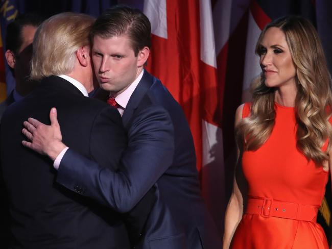 Donald Trump and his son Eric Trump embrace after delivering his acceptance speech at the New York Hilton Midtown. Picture: Getty