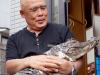 Odd things man does with pet caiman