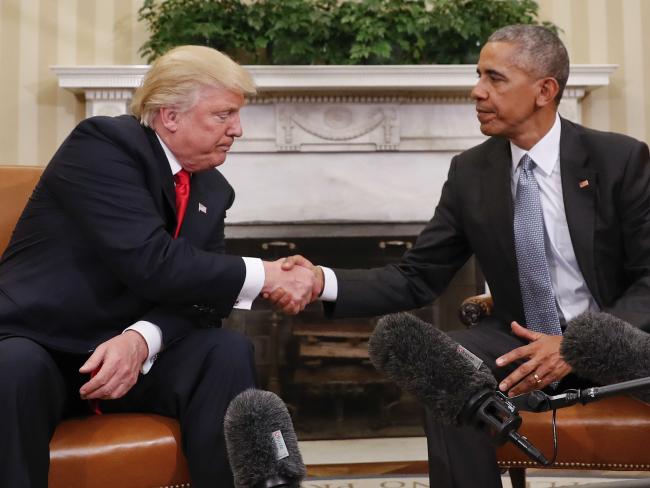Awkward encounter: President Barack Obama and President-elect Donald Trump shake hands following their meeting in the Oval Office of the White House in Washington on Thursday. Picture: Pablo Martinez Monsivais/AP