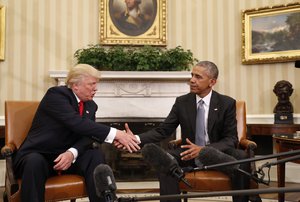 President Barack Obama shakes hands with President-elect Donald Trump in the Oval Office of the White House in Washington