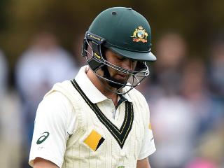 Australian batsman Callum Ferguson leaves the field after being run out for 3 runs on day one of the 2nd Test match between Australia and South Africa at Bellerive Oval in Hobart, Saturday, Nov. 12, 2016. (AAP Image/Dave Hunt) NO ARCHIVING, EDITORIAL USE ONLY, IMAGES TO BE USED FOR NEWS REPORTING PURPOSES ONLY, NO COMMERCIAL USE WHATSOEVER, NO USE IN BOOKS WITHOUT PRIOR WRITTEN CONSENT FROM AAP