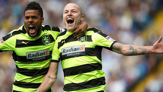 LEEDS, ENGLAND - SEPTEMBER 10: Aaron Mooy of Huddersfield Town celebrates with Elias Kachunga of Huddersfield Town after scoring to make it 0-1 during the Sky Bet Championship match between Leeds United and Huddersfield Town at Elland Road on September 10, 2016 in Leeds, England. (Photo by Robbie Jay Barratt - AMA/Getty Images)