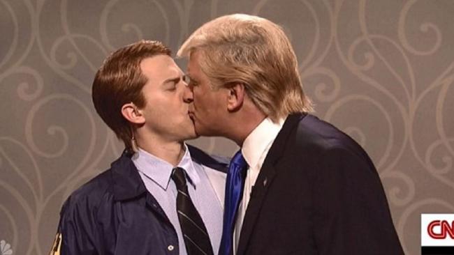 Alec Baldwin as Donald Trump kisses FBI agent. Picture: Supplied.