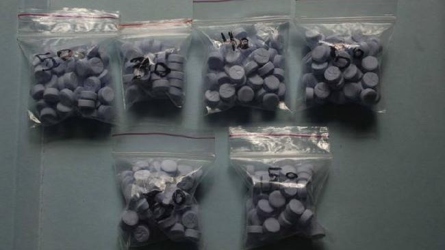 Blue scissor NDOMe pills (above) have been sold as MDMA or ecstasy and chased frightening hallucinogens in users.