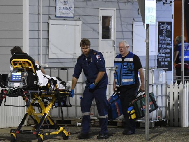 Paramedics wheel out a man from the Hot Kandi Horror Mansion Halloween Party in Sydney last month. Picture: Gordon McComiskie.