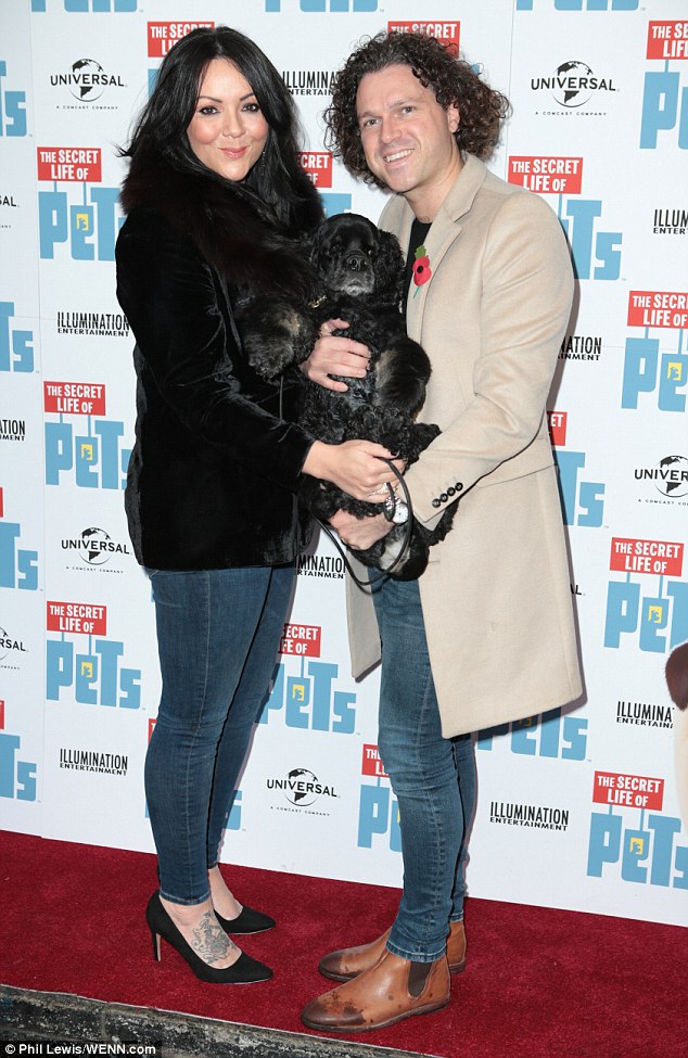 Puppy love: Martine McCutcheon, 40, looked happily loved-up with her husband Jack McManus as they attended the UK premiere of The Secret Life of Pets in London on Saturday