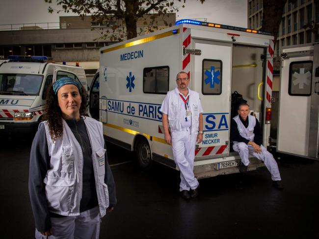 Doctor Christelle Dagron, anaesthetist Jerome Gouvernaire and driver Christophe Brancourt were the first medical team to enter the Bataclan concert hall after the murders. Picture: AFP/Martin Bureau