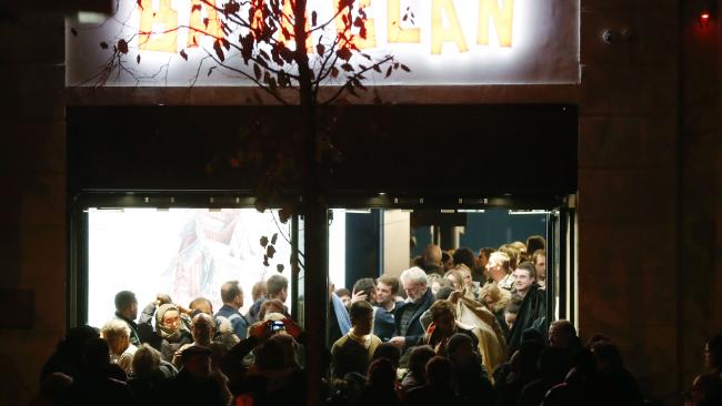 People leave the Bataclan concert hall in Paris on November 12, 2016, after the reopening concert by British musician Sting to mark the first anniversary of the November 13 Paris attacks. Picture: AFP / Francois Guillot.