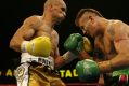 Squaring up: Green and Mundine in their 2006 showdown.