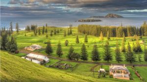 Beautiful and dramatic dawn light sweeps over the Kingston Gold course on Norfolk island.