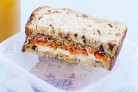 Carrot, honey, and raisin sandwich