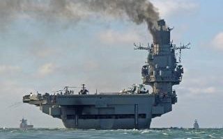 The Russian aircraft carrier Admiral Kuznetsov passes within a few miles of Dover, in the southeast of England as a fleet of Russian warships sail through the North Sea, and the English Channel 