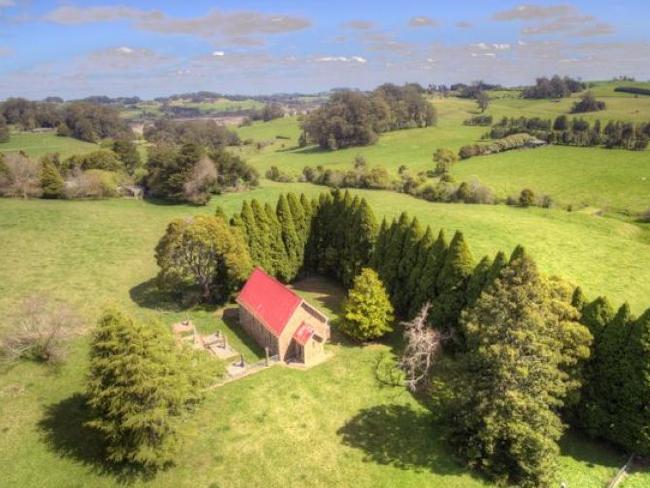 The church also includes a 14-stone graveyard, the oldest being from 1886. Picture: LJ Hooker