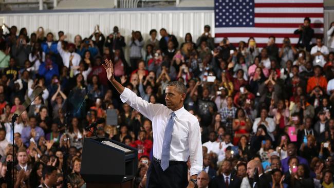 U.S. President Barack Obama waves to the crowd after speaking about health care at the Prince Georges Community College on September 26, 2013 in Largo, Maryland. Picture: Mark Wilson/Getty Images/AFP.