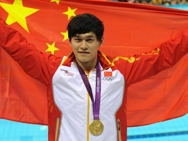 Sun Yang celebrates after smashing Grant Hackett’s 1500m record to win gold at the London Olympics in 2012.