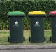 Pictures shows Lake Macquarie's three bins. The green-lid bin is for green waste, the red-lid bin for general waste, the ...