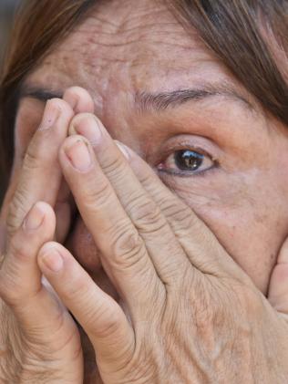 A woman cries as she waits for news of her loved ones in Manta, in the Ecuadorean coastal province of Manabi. Picture: AFP/LUIS ACOSTA