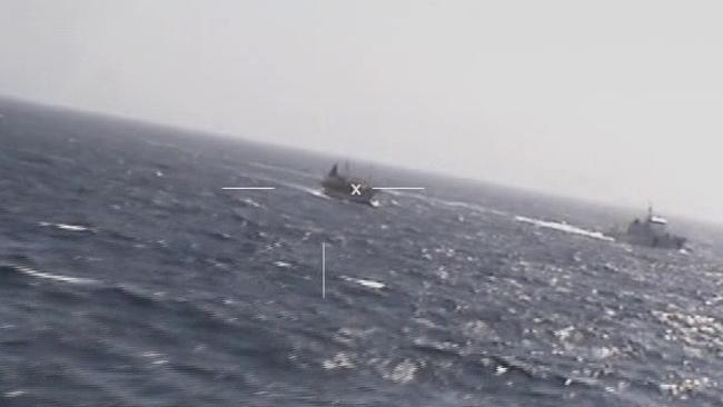 Chinese fishing boat Lu Yan Yuan Yu 010, left, and coast guard vessel GC-28 Prefecto Derbes. Source: AFP