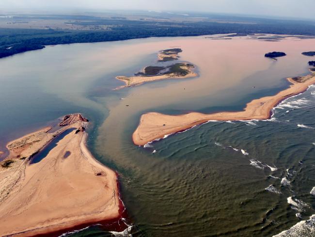 Handout picture released on November 23, 2015 by Espirito Santo State Press Office showing an aerial view of the Rio Doce. Picture: Fred Loureiro/Espirito Santo State Press Office/AFP