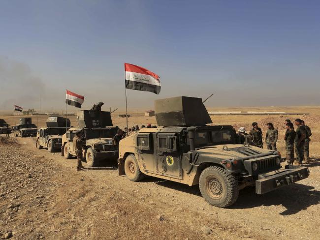 Iraq's elite counter-terrorism forces patrol outside the town of Bartella, Iraq. Picture: AP