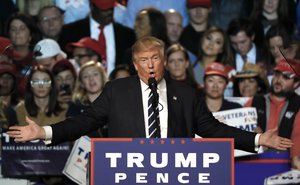 In this Tuesday, Nov. 8, 2016 file photo, Republican presidential candidate Donald Trump speaks at a campaign rally in Grand Rapids, Michigan.