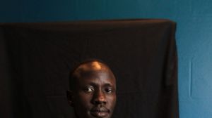 EMBARGO FOR BOSS MAG> SEE AFR PIC DESK> SYDNEY, AUSTRALIA - AUGUST 22: Sudanese refugee and lawyer Deng Adut poses for a ...